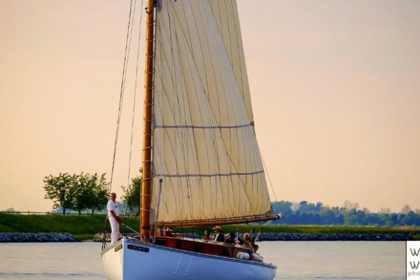 sailboat in the water and coastline
