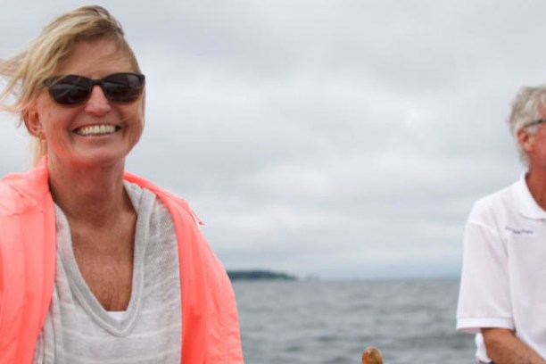 two people enjoying sailing