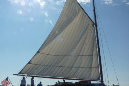 Embrace the wonder and awe of nature aboard a private charter with Sail Selina in St. Michaels, MD - This spectacular image captures the magic and serenity of a glittering sun on the tranquil waters of the Chesapeake Bay - Book your private Sail Selina adventure today