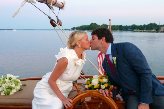 Experience the enchantment and bliss of a new marriage aboard Sail Selina in St. Michaels, MD - Capturing cherished moments like this is what makes sailing with us unforgettable - Book your Sail Selina adventure now!