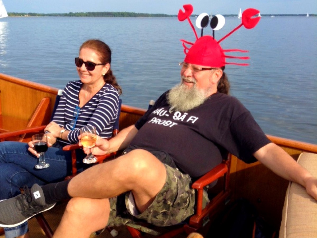 Enjoy a fun and relaxing experience aboard Sail Selina while wearing our silly crab hat - Book now and join the fun!