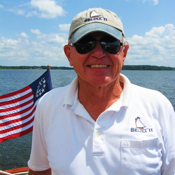 Sail Selina custom logo embroidered on both polo shirts and collectable baseball caps